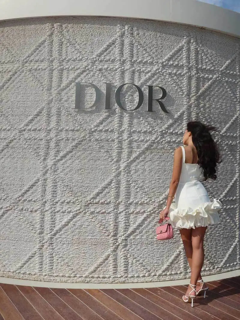 Elegant Sleeveless Mini Dress with Dramatic Ruffled Hem