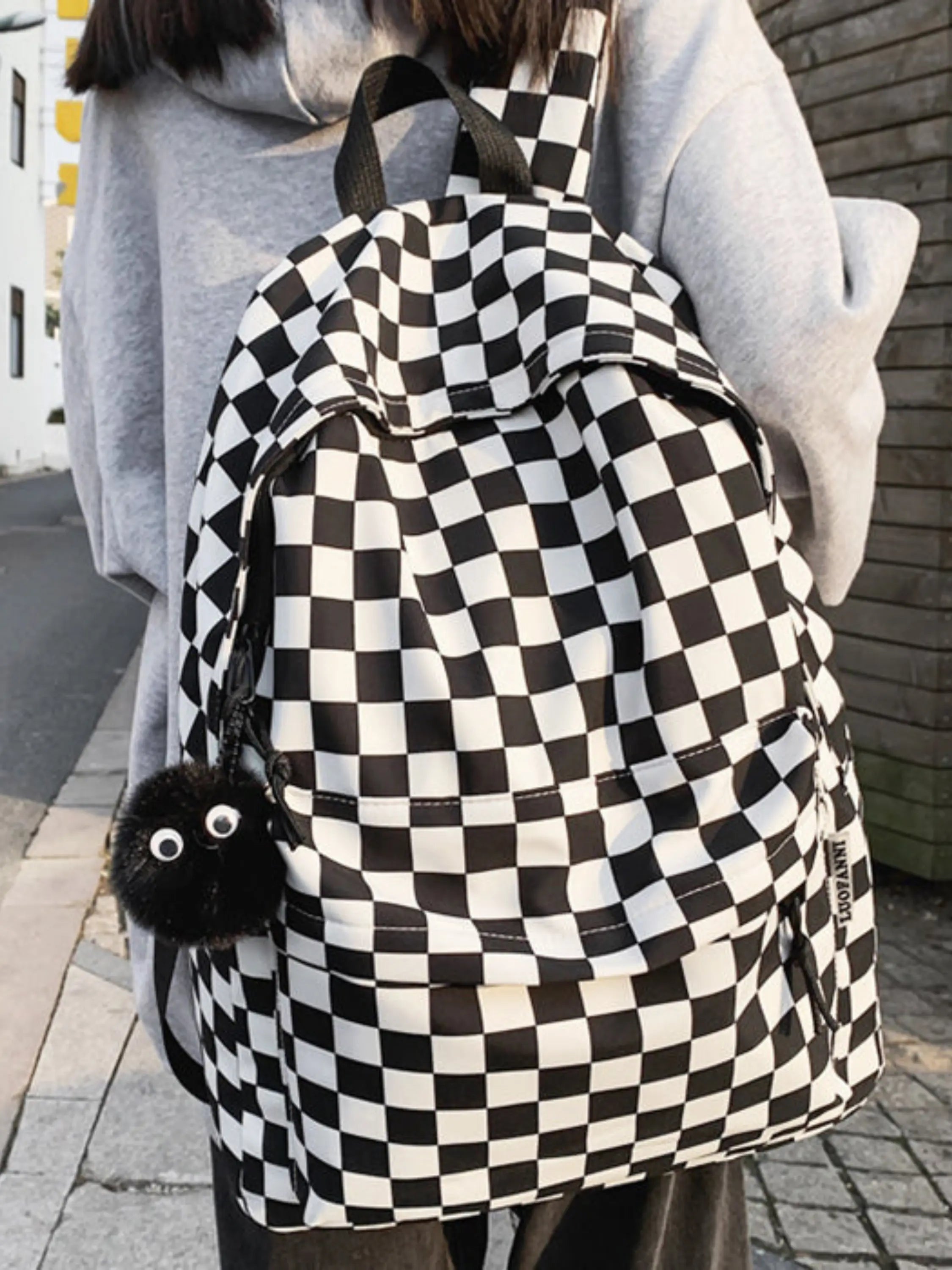 Checkered Backpack with Fun Pom-Pom Charm