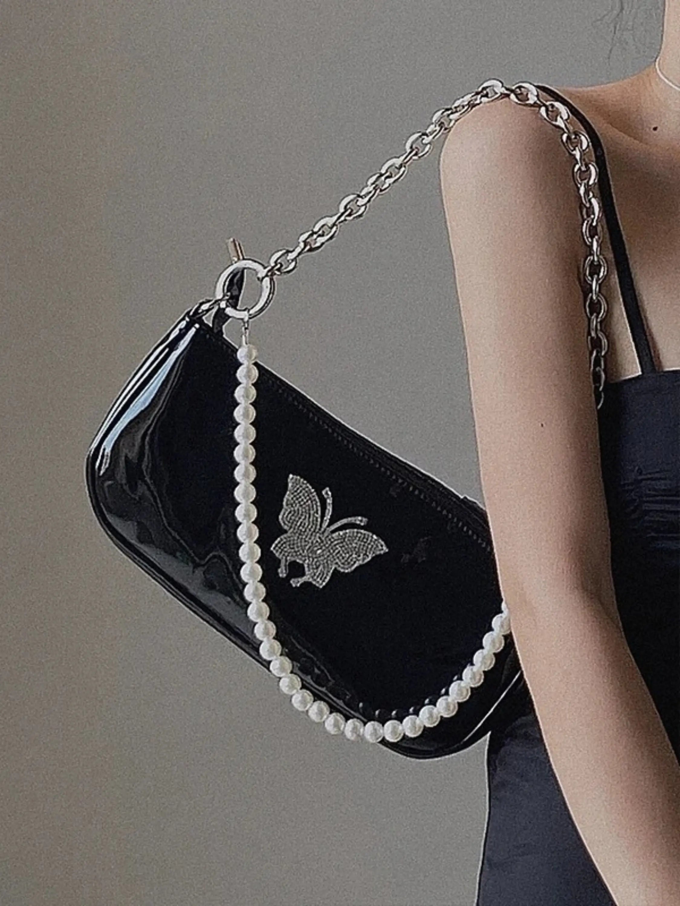 Stylish Quilted Shoulder Bag with Butterfly Detail and Chain Strap