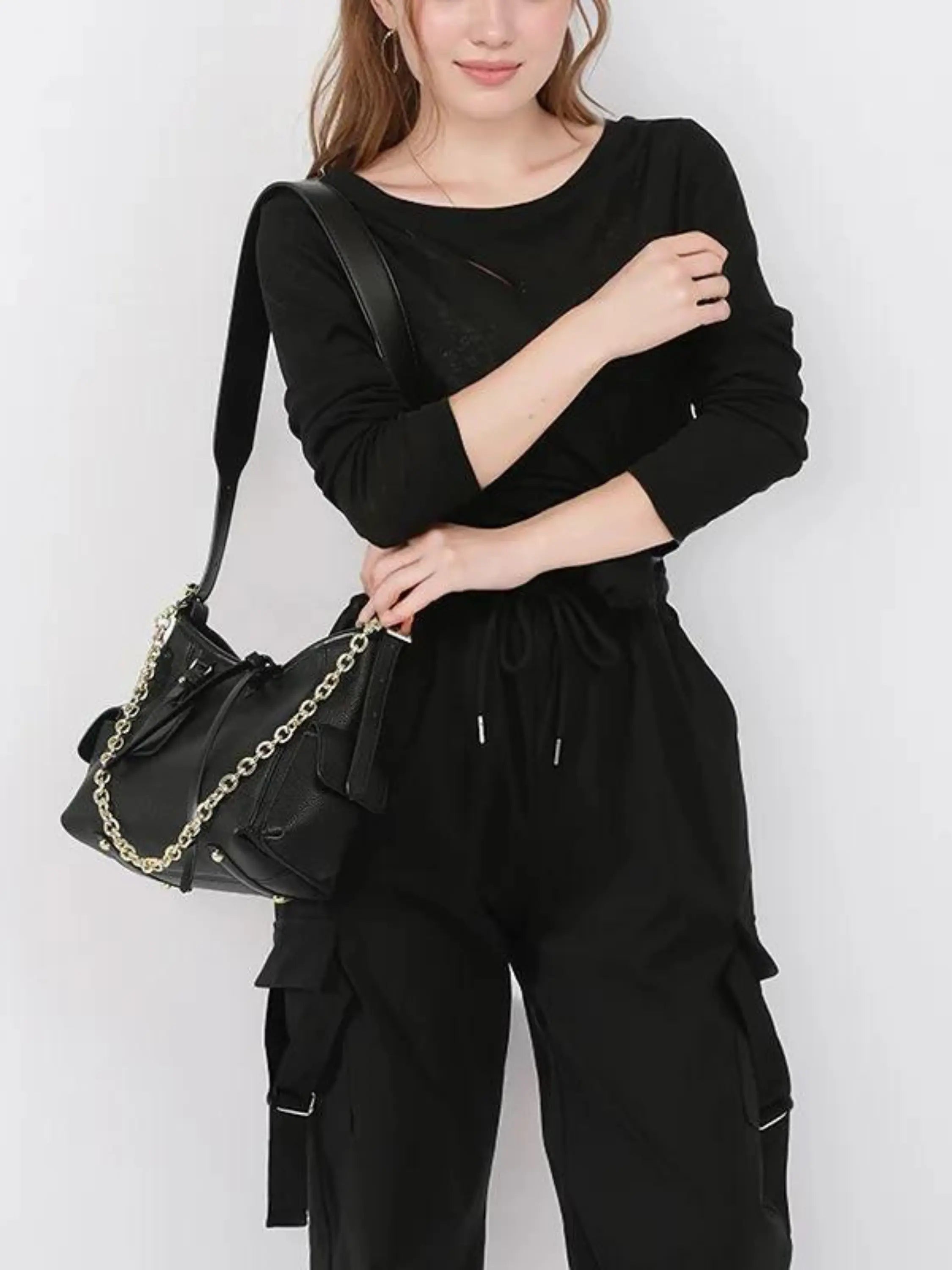 Black Leather Shoulder Bag with Chain Accent
