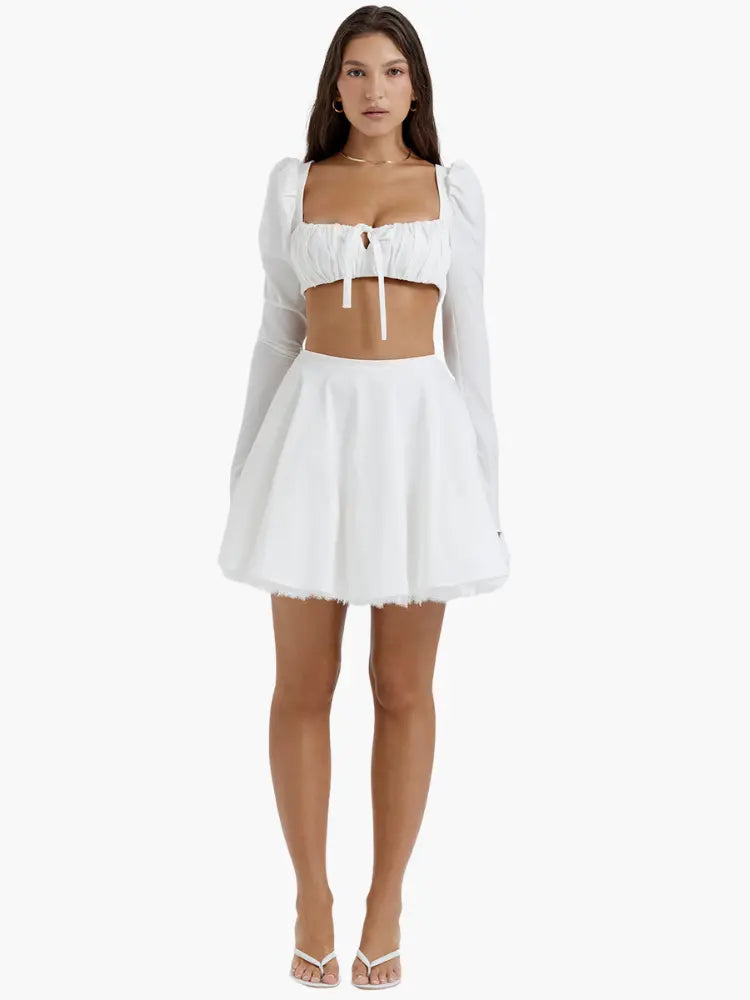 Chic Two-Piece Set with Ruched Crop Top and Flowy A-Line Skirt