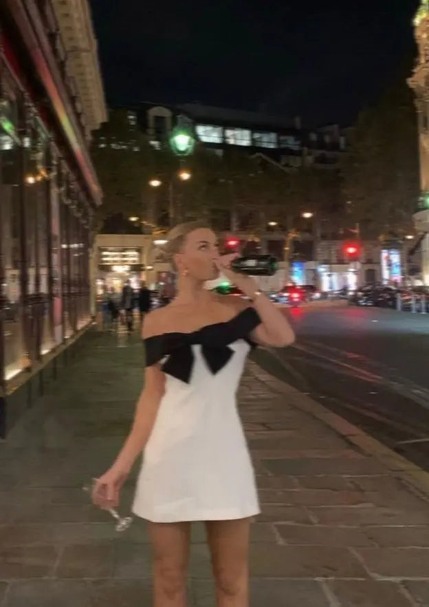 Off-Shoulder Mini Dress with Black Bow Accent