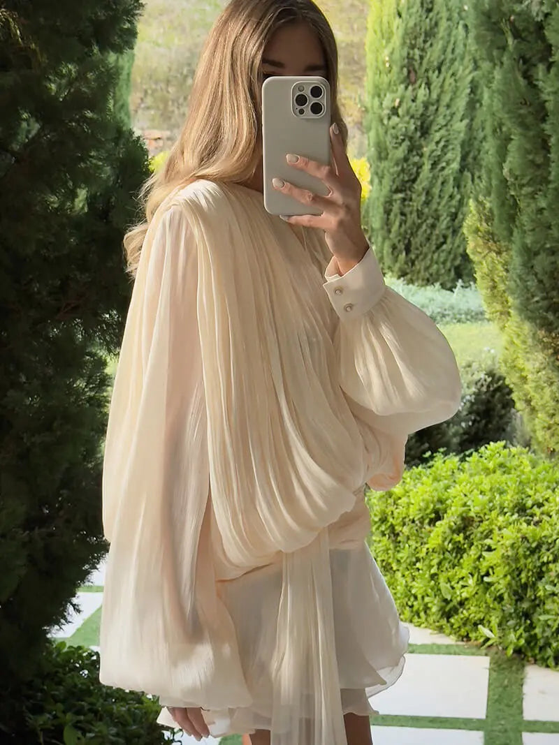 Elegant Pleated Mini Dress with Statement Sleeves