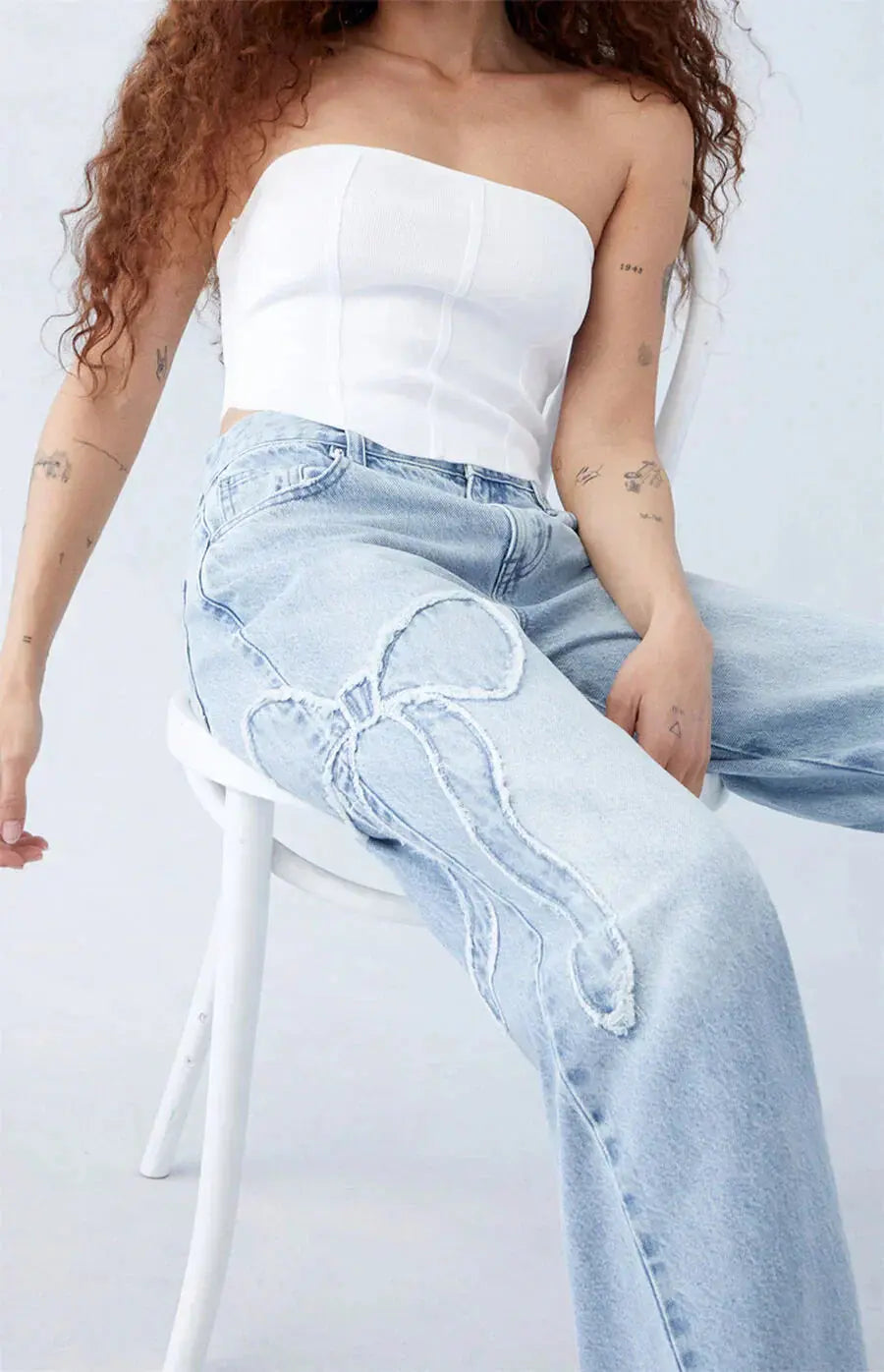 Light Wash Wide-Leg Jeans with Distressed Heart Detail