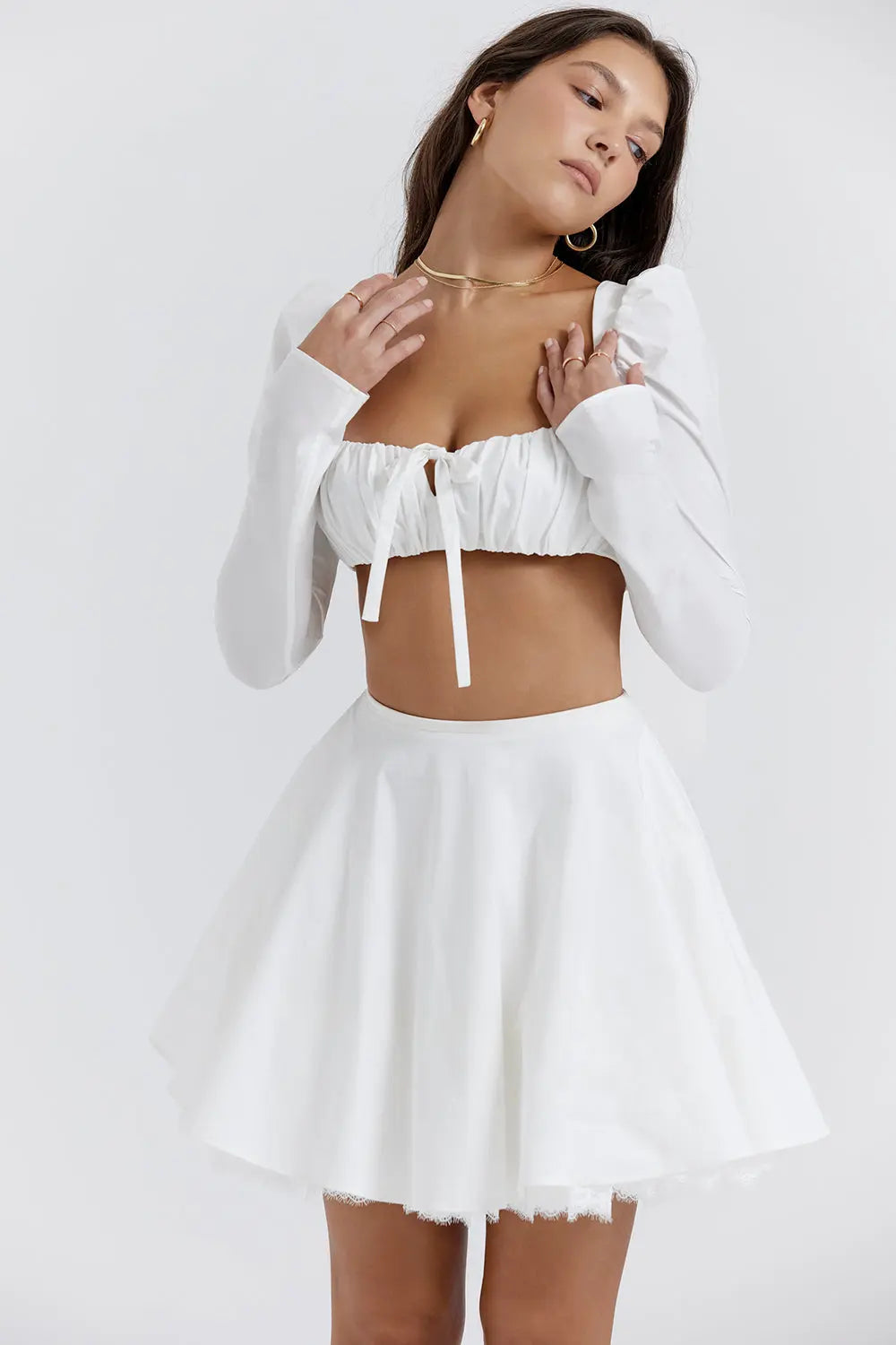 Chic Two-Piece Set with Ruched Crop Top and Flowy A-Line Skirt
